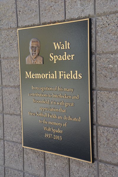 Walt Spader Memorial Fields bronze plaque mounted on masonry